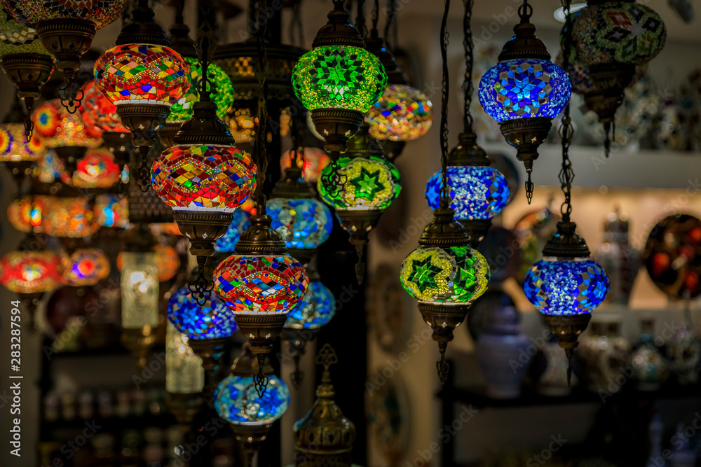 Traditional colorful decorative Turkish oriental lamps for sale in at a souvenir shop in Kotor old town in Montenegro