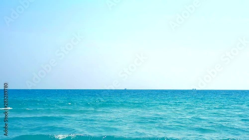 deep blue sea clear water surface and clear sky