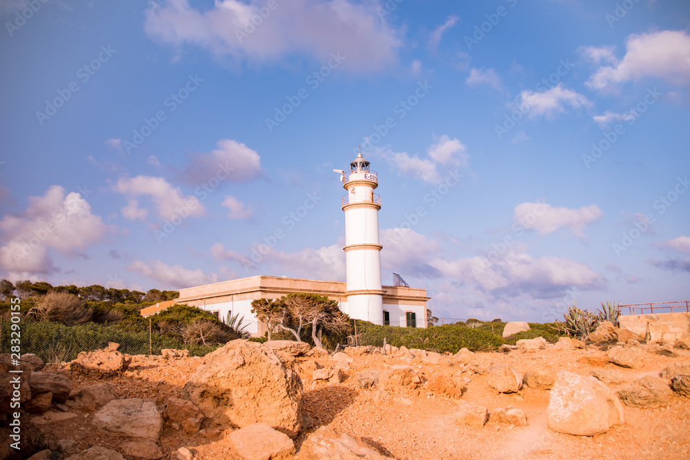 Lighthouse on a rocky beach in Mallorca