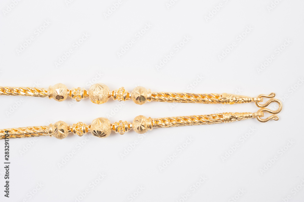 Gold chain necklace isolated on white background. Gold chain necklace isolated on white background.
