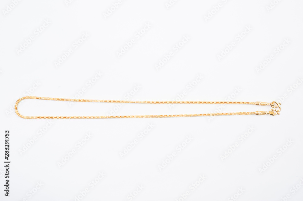Gold chain necklace isolated on white background. Gold chain necklace isolated on white background.