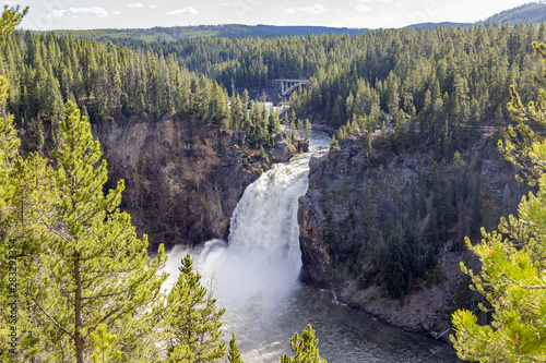 The upper falls of the Yellowstone river with Chittenden Bridge in the background..