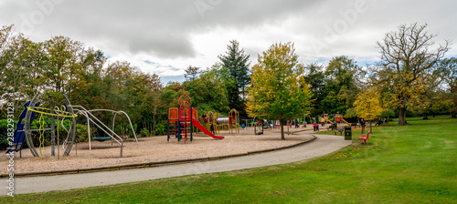 Obraz na płótnie Large children playground area with slides, bars, swings and other equipment in Hazlehead park, Aberdeen, Scotland w salonie