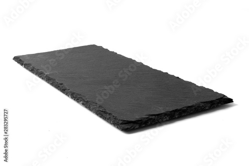 Black stone plate isolated on white