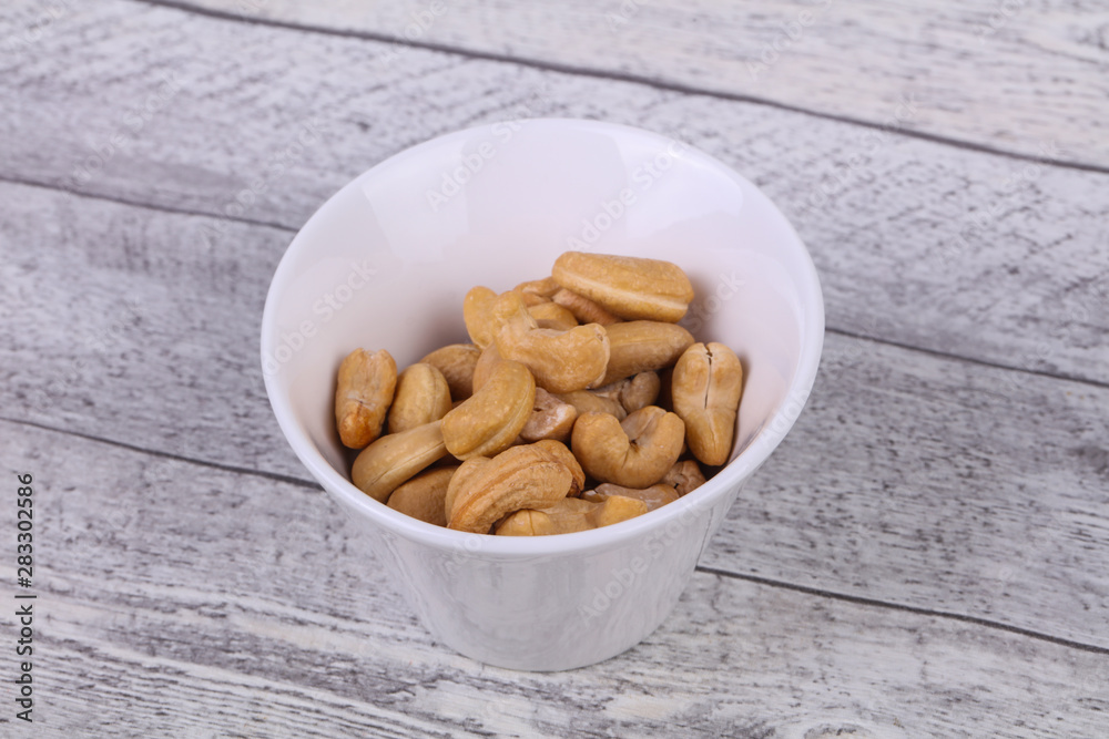 Cashew nuts heap in the bowl Cashew nuts heap in the bowl