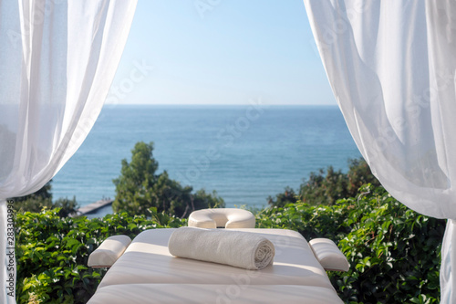 Fototapeta Naklejka Na Ścianę i Meble -  Massage table with sea view