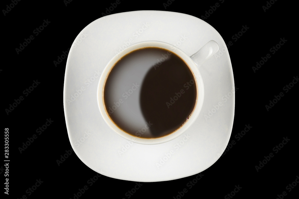 Cup of coffee on a black background - top view Cup of coffee on a black background - top view
