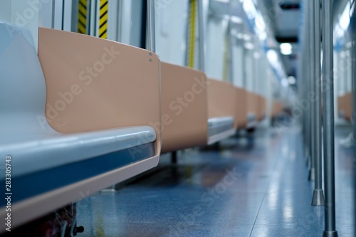 low angle and inside of empty brand new subway car. Perspective view