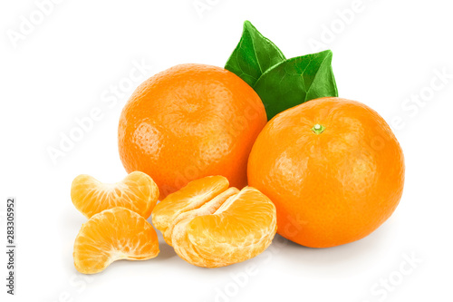 tangerine or mandarin fruit with leaves isolated on white background