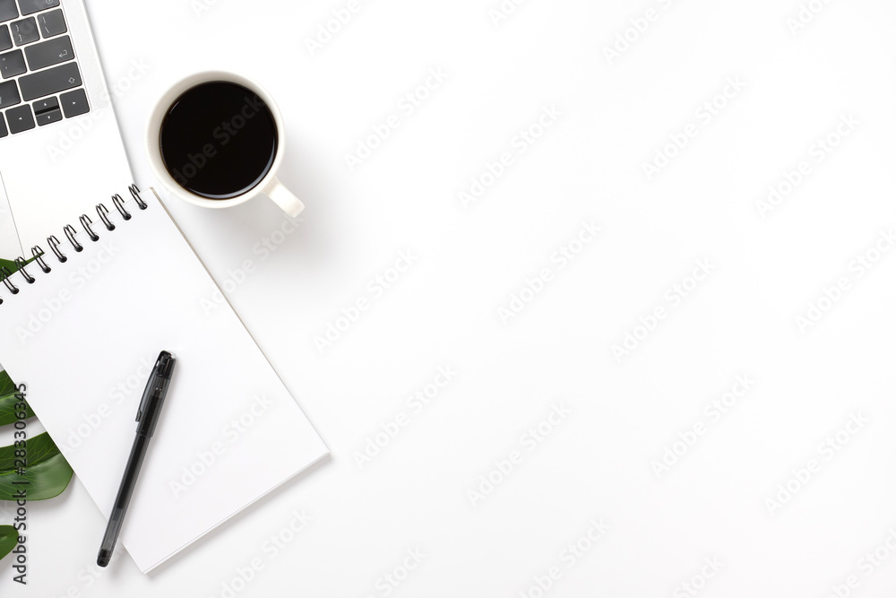 office table desk. Workspace with laptop, notepad, coffee cup and pen on white background. Flat lay, top view. office table desk. Workspace with laptop, notepad, coffee cup and pen on white background. Flat lay, top view.