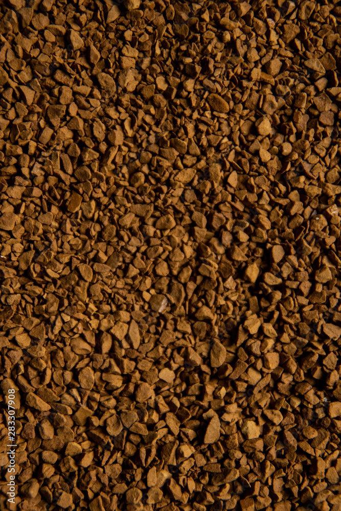 a background of fresh ground coffee granules