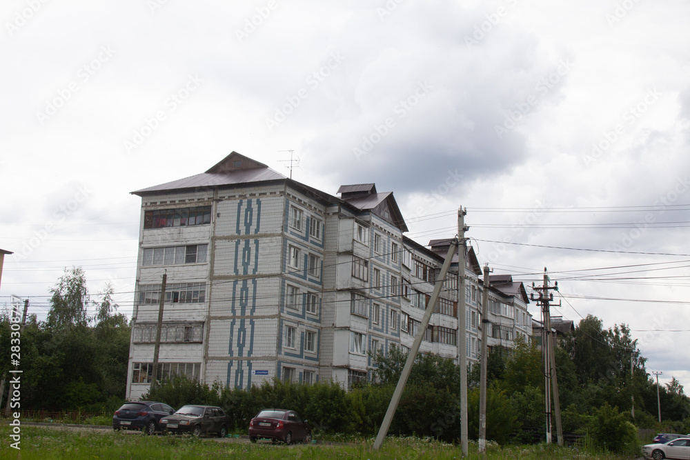 An ordinary apartment building in an urban-type settlement in the suburbs