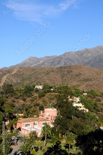 View of villas in the mountains above Marbella, Andalusia, Spain. © arenaphotouk
