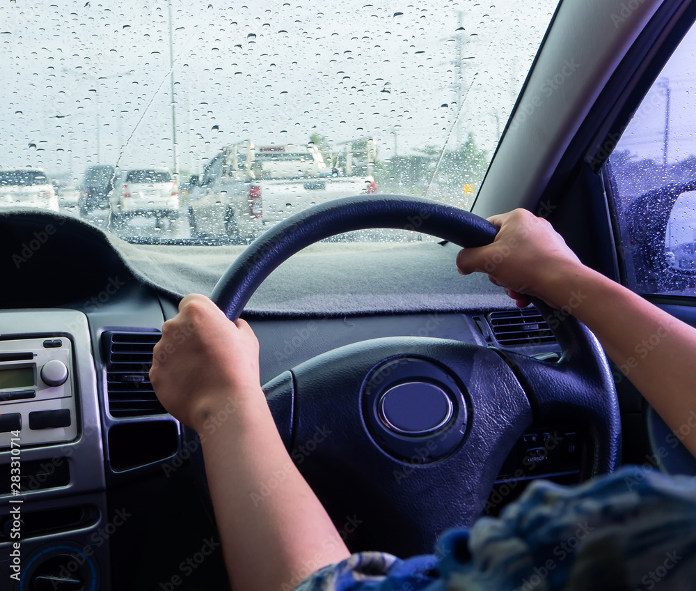 Naklejka premium Drive in a rainy day