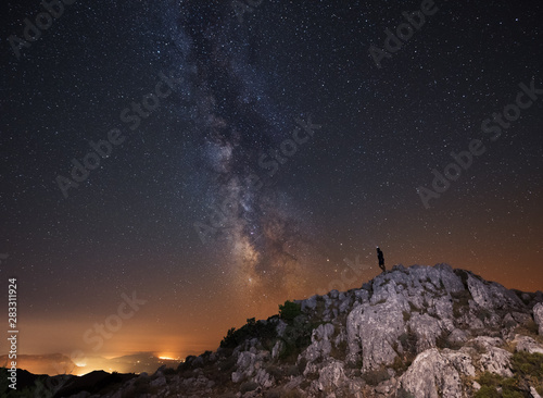Milky way over a mountain in Italy