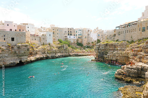 Polignano a mare breathtaking sight, Apulia, Italy. Italian panorama. Cliffs on adriatic sea.