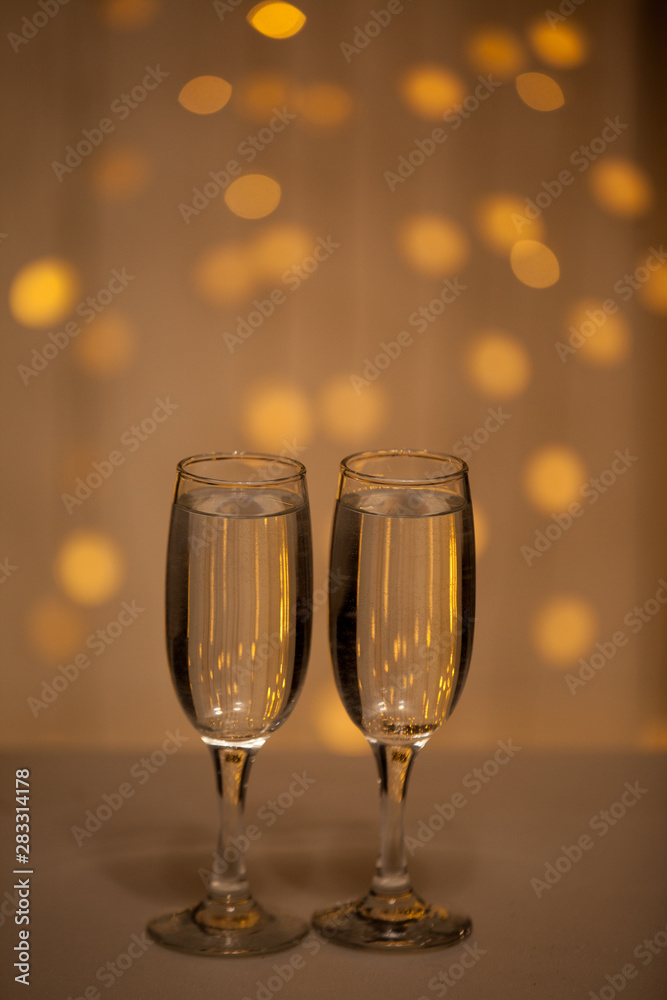 Glasses on a background of illumination Glasses on a background of illumination