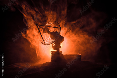 Silhouettes of satellite dishes or radio antennas against night sky. Space observatory. photo