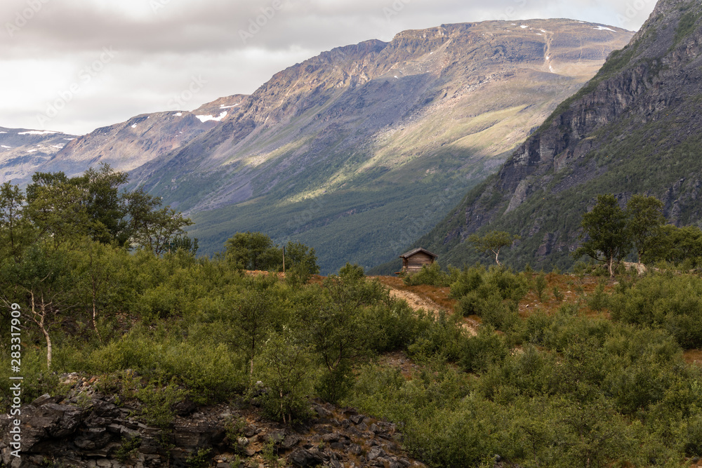 Fototapeta premium Hike to the Gorsa Bridge in the Kåfjorddalen valley