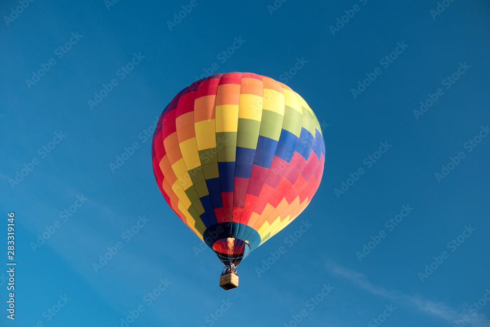 Fototapeta premium Detail of a starting colorful hot air balloon