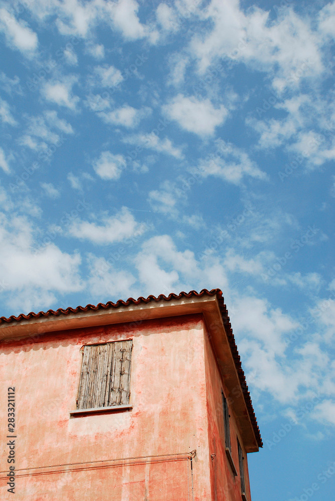 An historic building in the seaside town of Caorle in the Veneto region of Italy