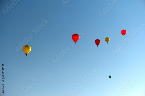 Several hot air balloons in the sky