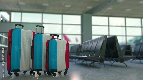 Travel suitcases with flag of Luxembourgh. Luxembourghian tourism conceptual 3D animation photo