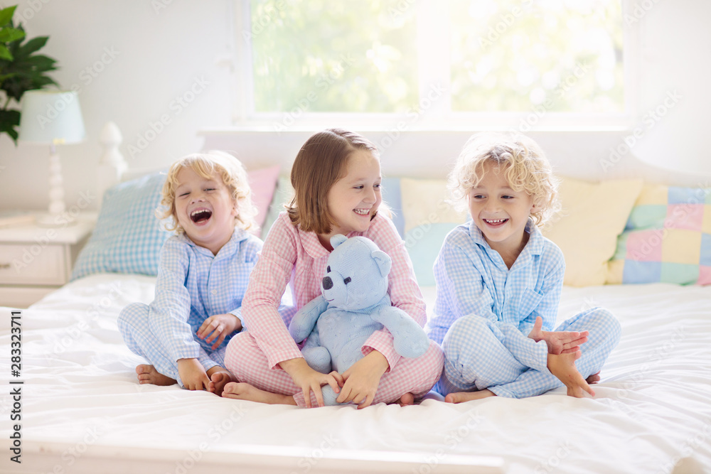 Kids play in bed. Children at home. Kids play in bed. Children at home.