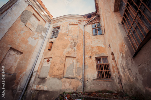 Walls with windows of old abandoned mansion palace