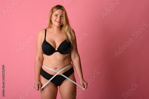 Photography thick beautiful girl measures waist