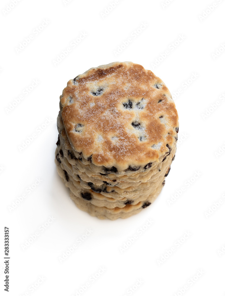 Stack of iced Welsh cakes isolated on white Stack of iced Welsh cakes isolated on white