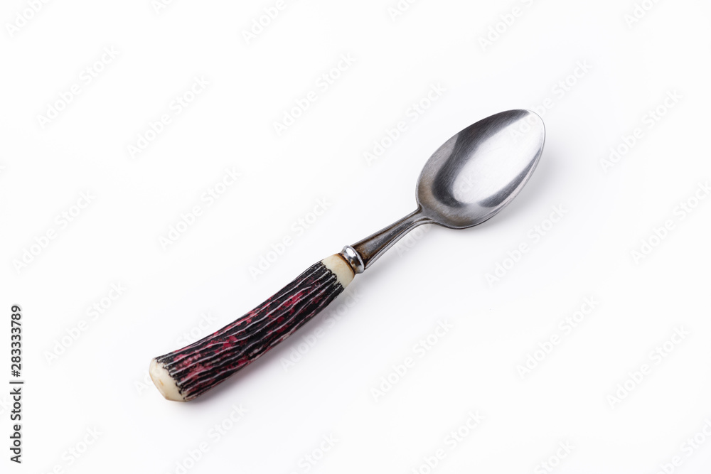 old spoon on isolated white background old spoon on isolated white background