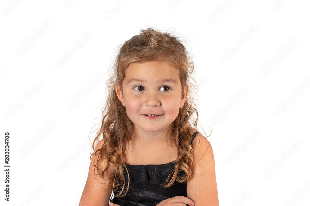A girl is smiling by something and looking to the side A girl is smiling by something and looking to the side