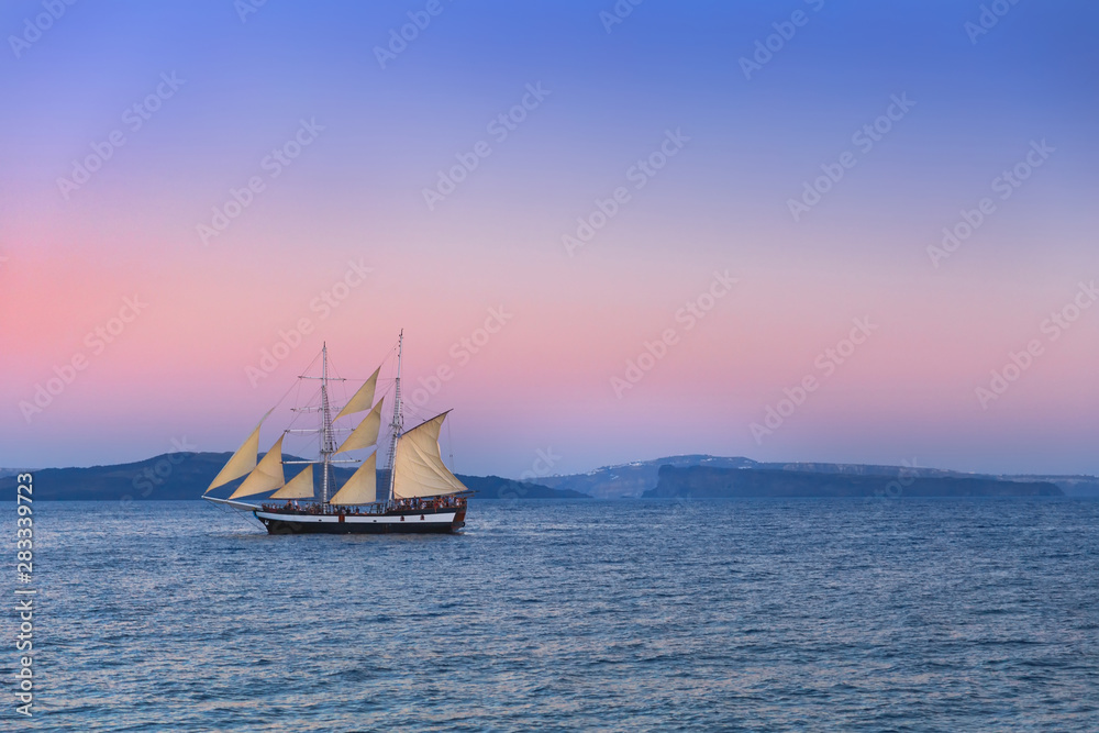 Fototapeta premium Yacht in sunset light