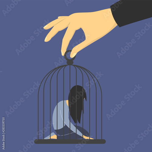 Sad woman in the cage. Man abuse woman