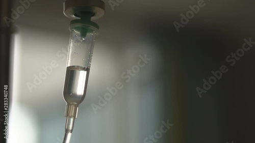 saline water drops machine or medical instruments for infusion to blood vessel and for treatment sick or patient healthcare in hospital or clinic on 4K photo