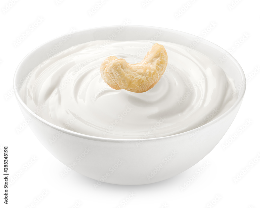 cashew nut, with sour cream, yogurt, isolated on white background, clipping path, full depth of field cashew nut, with sour cream, yogurt, isolated on white background, clipping path, full depth of field