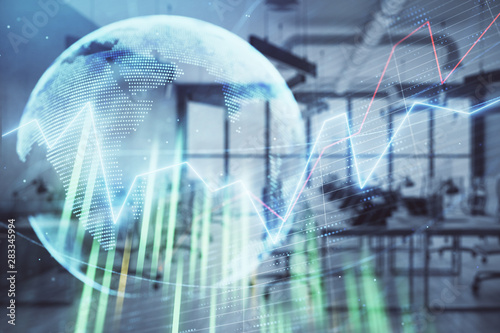 Stock and bond market graph and world map with trading desk bank office interior on background. Multi exposure. Concept of international finance