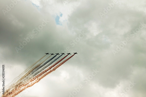 Saint-Petersburg. Russia. 28 July 2019. Parade in honor of the day of the Navy. Columns of planes high in the sky. Aircraft performance aerobatic team Swifts