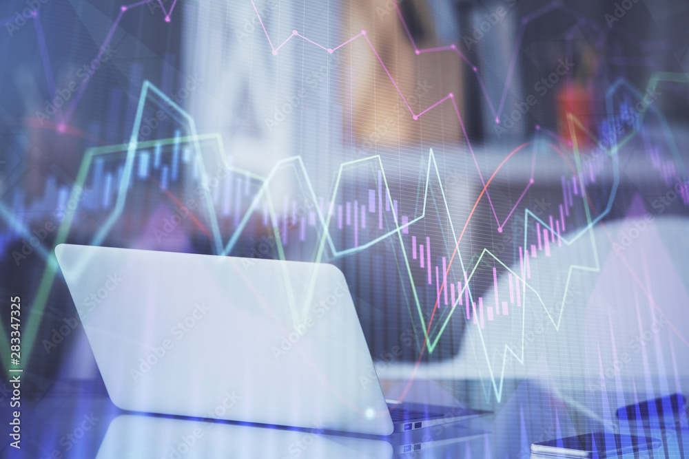 Forex Chart hologram on table with computer background. Multi exposure. Concept of financial markets.