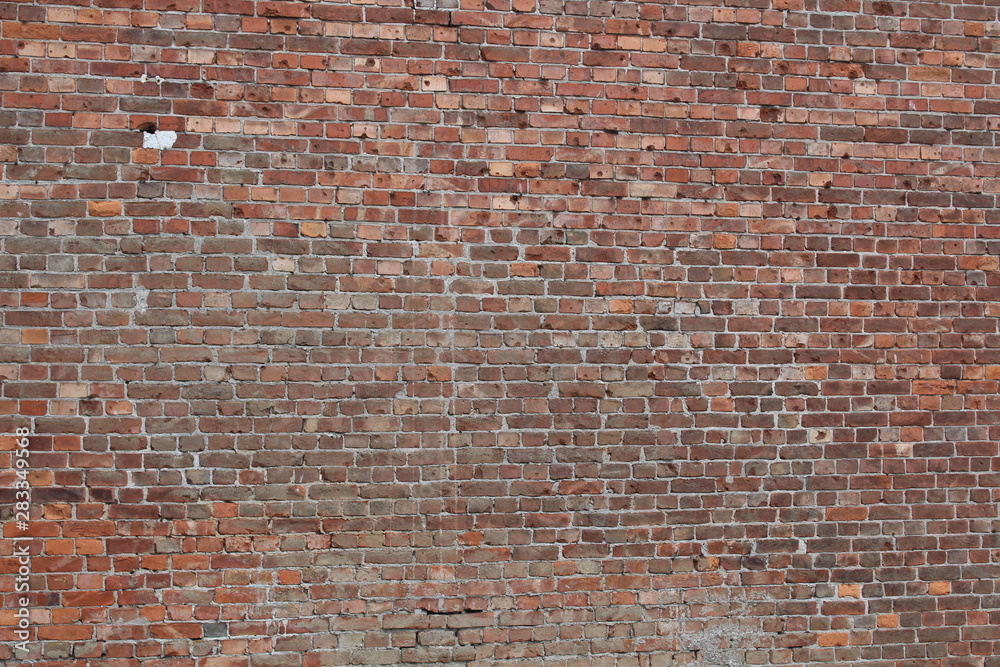 Brickwork, a beautiful wall. Interesting stone background. - obrazy, fototapety, plakaty 
