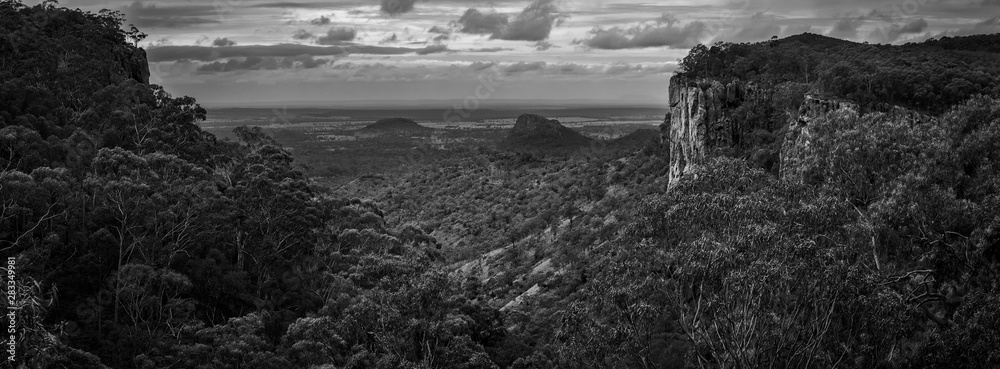 Minerva Hills is a national park in Central Queensland, Australia. The park features a rugged landscape with volcanic peaks, sheltered gorges, sheer cliffs, open woodlands and dry rainforest.-Picture.