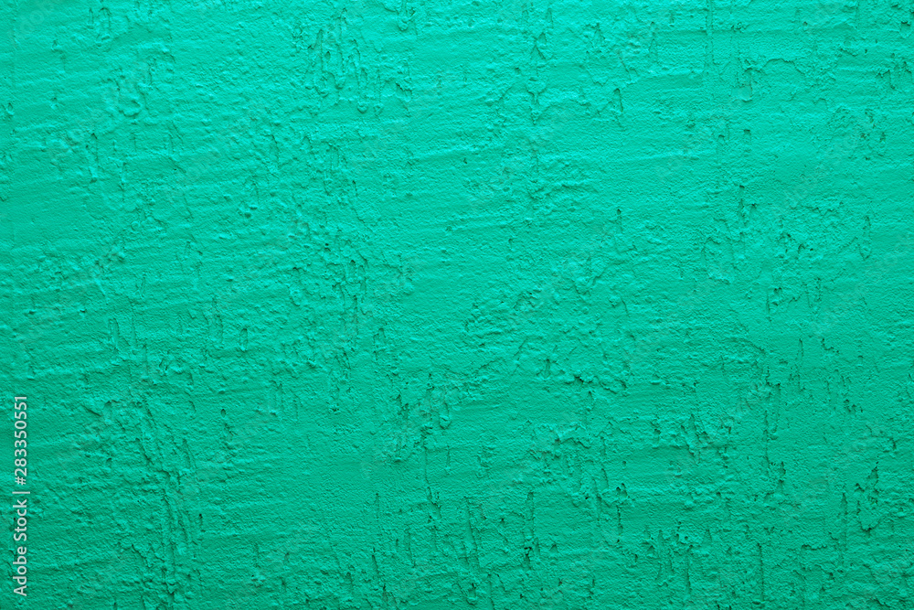 Blue cement wall,Rough surface look like blue sand.Background texture design. Green cement wall texture background