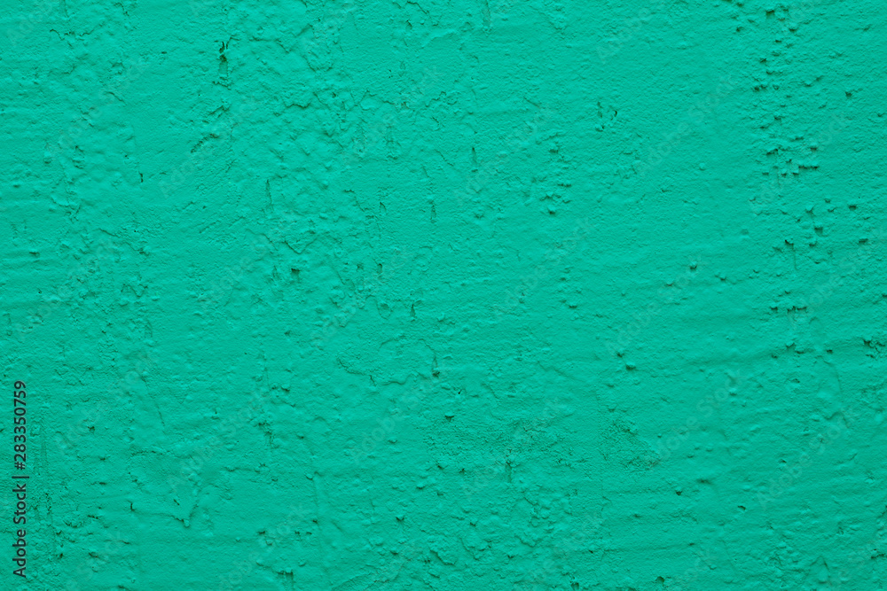 Blue cement wall,Rough surface look like blue sand.Background texture design. Green cement wall texture background