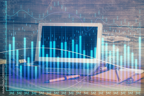 Multi exposure of forex chart and work space with computer. Concept of international online trading. © peshkova