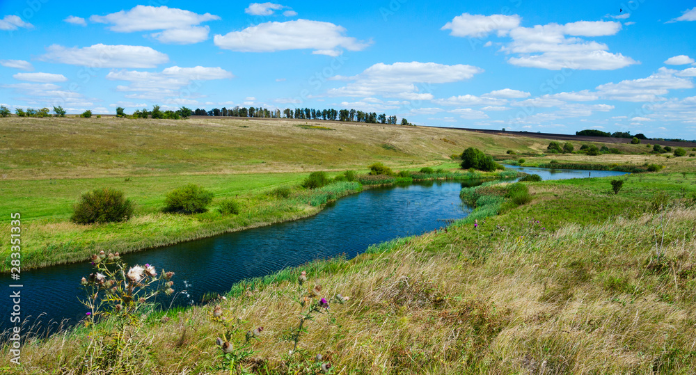 landscape with river and blue sky