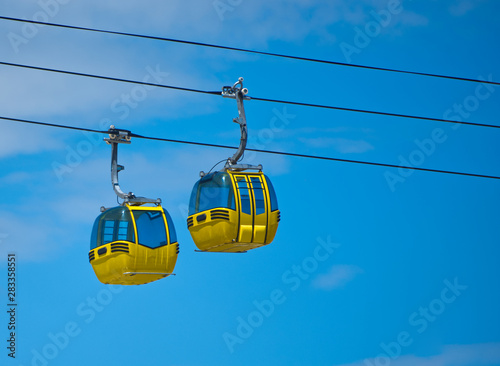 two yellow telegondolas