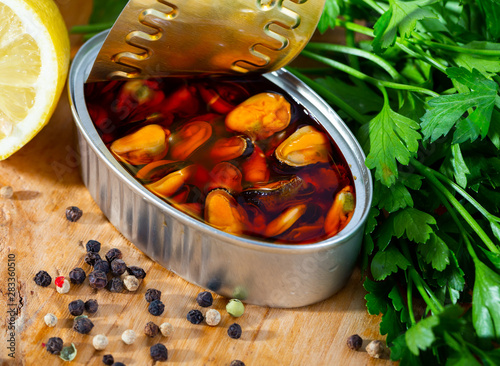 Deliciously pickled mussels with lemon and greens, nobody photo