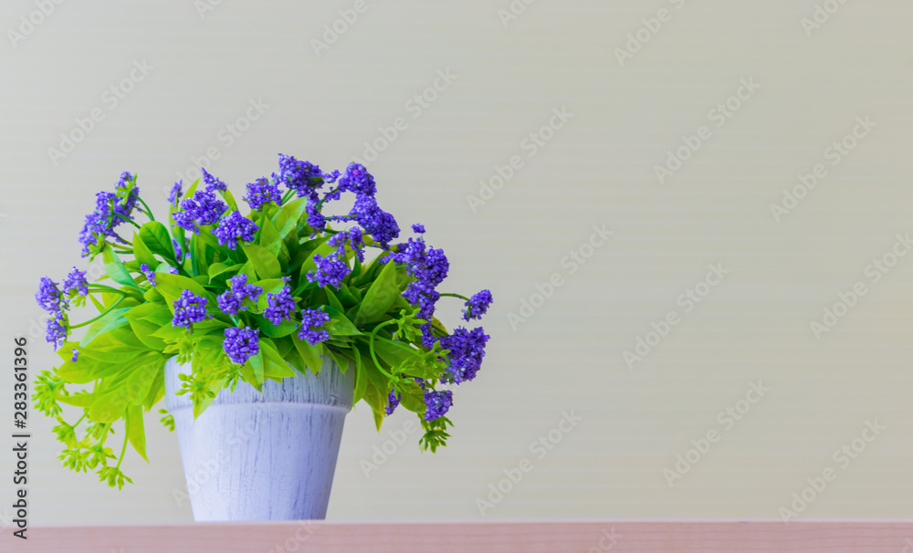  Purple flower vase on the table in the office White background. copy space