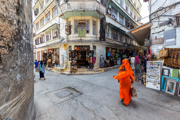 Fototapete Sansibar Lebendige Strassenecke in Stone Town  © mikefoto58